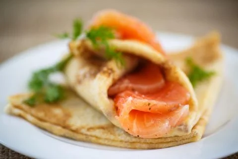 Stack of pancakes with salted salmon 스톡 사진