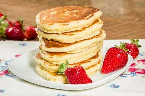 Stack of pancakes with strawberries Stock Photos