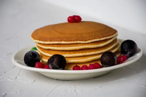 Stack of pancakes with syrup Stock Photos