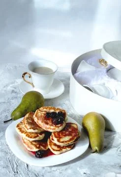 Stack of pancakes with syrup on a plate Stock Photos