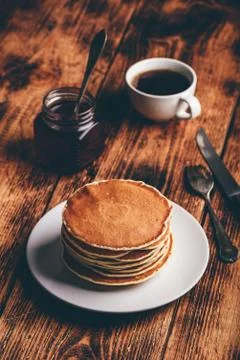Stack of pancakes on white plate Stock Photos