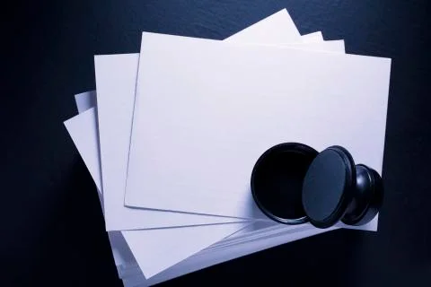 Stack of paper cards and seal 写真素材