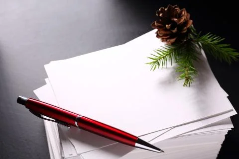 Stack of paper cards and twig of evergreen fir Stock Photos