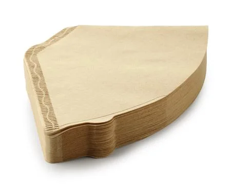 Stack of paper coffee filters isolated on white Stock Photos