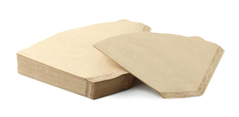 Stack of paper coffee filters isolated on white Stock Photos