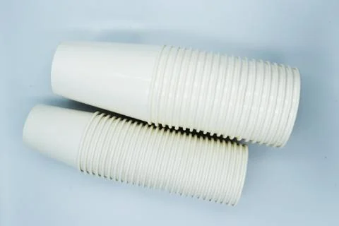 Stack of paper cup isolated on white background. Stock Photos