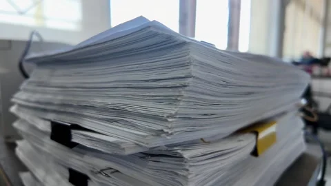 Stack of Paper Documents on Office Desk: Heavy Workload and Bureaucracy Concept Stock Footage 323429137