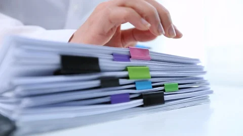 A stack of paper documents. Reports. Video stock 128804935