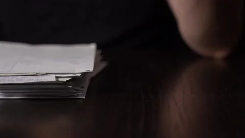 A Stack Of Paper Files Falls On The Table. Fists Hit the Pile of Papers Stock Footage 151473660