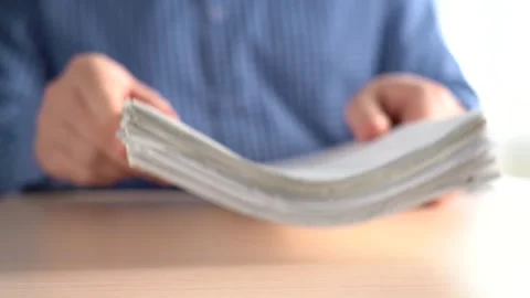A Stack Of Paper Files Falls On The Table. Office work concept. Stock Footage 167212650