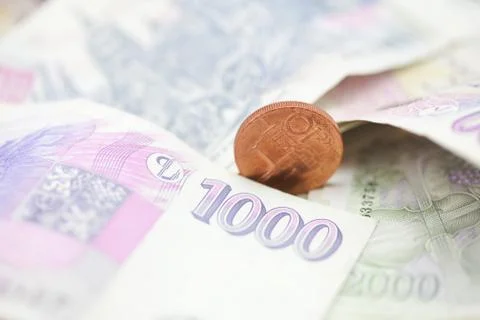 Stack of paper money and coins Stock-Fotos