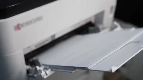 Stack of paper in printer tray Video stock 301409288