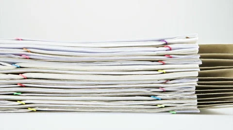 Stack paper report and envelope on table time lapse 스톡 동영상 49905424