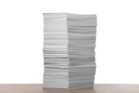 Stack of paper sheets on wooden table against white background Stock Photos