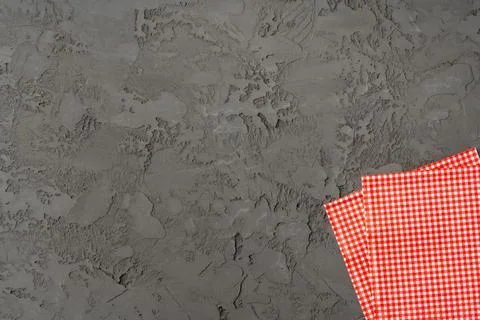 Stack of paper square napkins on gray background 스톡 사진
