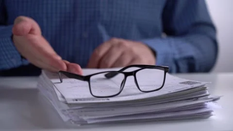 Stack of Papers and Glasses on the Background of the Manager. Stock Footage 150444679
