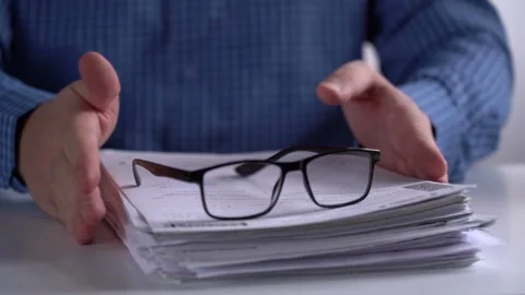Stack of Papers and Glasses on the Background of the Manager. Stock Footage 166226880