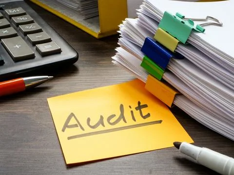 A stack of papers and the inscription audit. Stock Photos