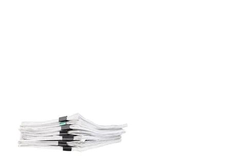 Stack of papers with paper clips, office folders. Copy space Stock Photos