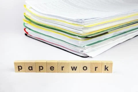 Stack of papers with word paperwork on wooden blocks Foto stock