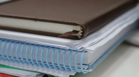 Stack of paperwork and notebook Stock Photos