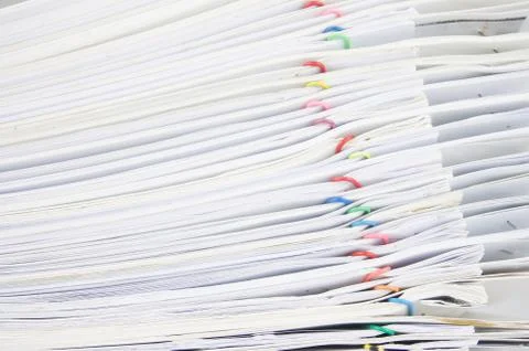 Stack paperwork with colorful paper clip overlap old report Stock Photos