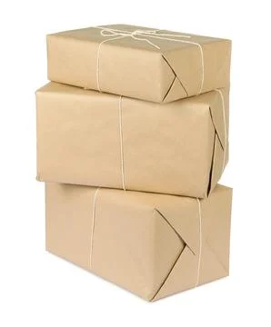 Stack of parcel boxes wrapped in paper isolated on white Foto stock