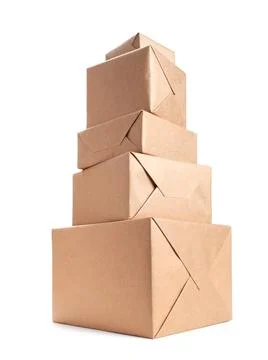 Stack of parcel wrapped with brown packing paper Stock Photos