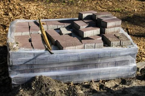 Stack of the pavement slabs is ready for usage placed at construction site Stock Photos