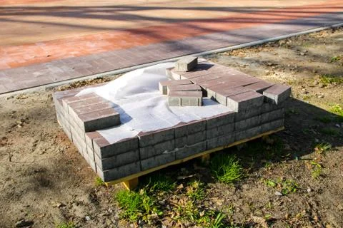 Stack of the pavement slabs is ready for usage placed at construction site Foto stock