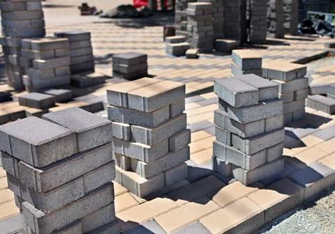 Stack of paving stones on construction site Stock Photos