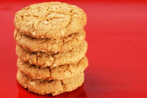 Stack of peanut butter cookies on red Stock Photos