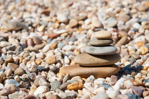 Stack of pebble stones on the beach Stock Photos