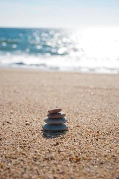Stack of pebble stones on the beach Stock Photos