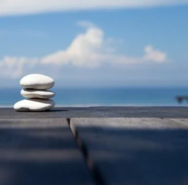 Stack of pebble stones at the beach Stock Photos