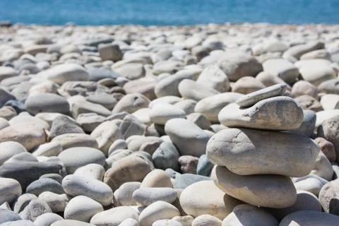 Stack of pebbles balance harmony zen on Love Beach, Aphrodite's Rock - Aphrodite Stock Photos