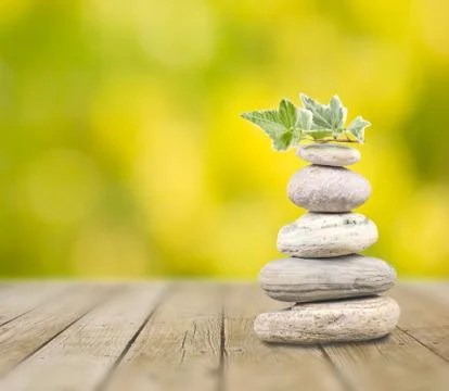 Stack pebbles on wooden table Fotos Stock