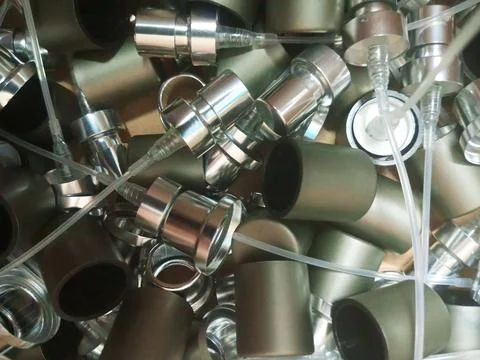 A stack of perfume spray caps Stock Photos