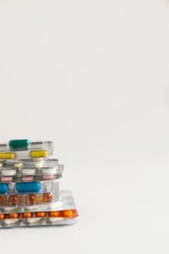 Stack of pills on a white background Stock Photos
