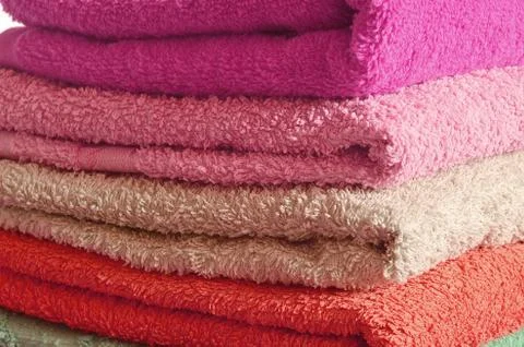 Stack of pink and purple towels Stock Photos