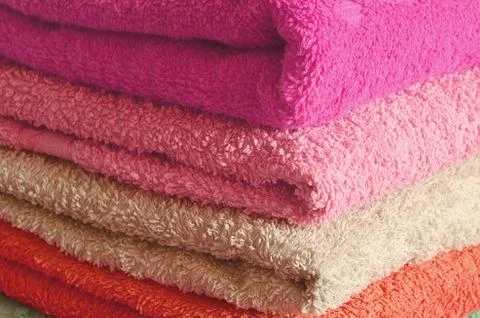 Stack of pink and purple towels Foto stock