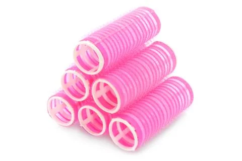 Stack of pink hair rollers Stock Photos