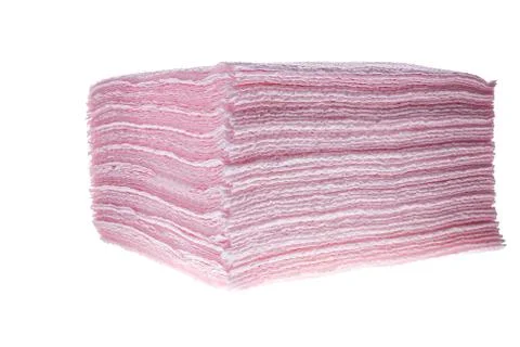 Stack of pink paper disposable napkins isolated on white background Stock-Fotos