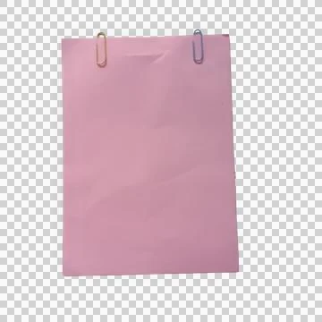 Stack of pink paper sheets held together by two colorful metal paper clips Фото