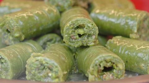 Stack of Pistachio Baklava on a plate Stock Footage 326980455