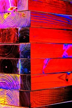 Stack of planed wooden blocks. Changed color scheme. Colorful background. T.. Stock Photos