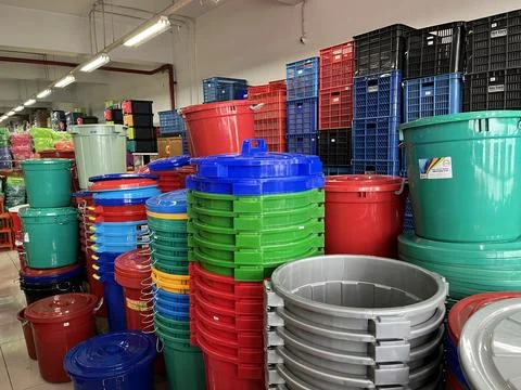 Stack of plastic bucket being displayed in a supermarket Stock Photos