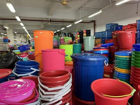 Stack of plastic bucket being displayed in a supermarket Stock Photos