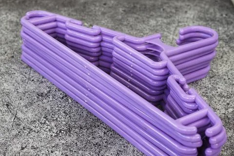 Stack of Plastic Clothes Hangers with Trouser Bar Stock Photos