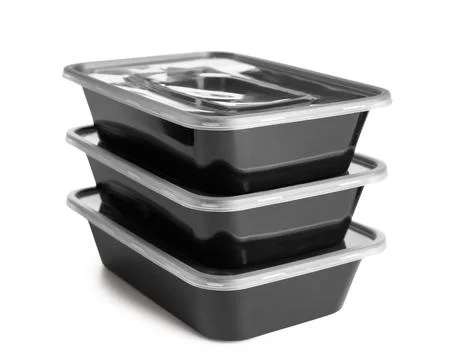 Stack of plastic containers for food isolated on white background, closeup Fotos de archivo